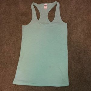 A blue green tank top from PINK